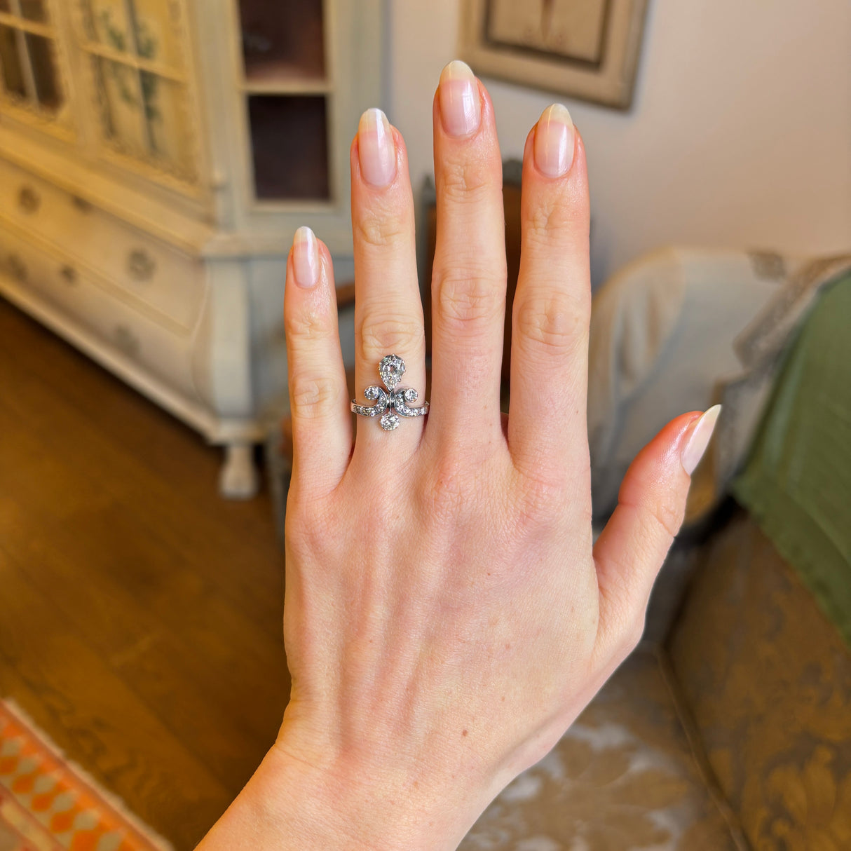 Antique, Edwardian pear cut diamond motif engagement ring