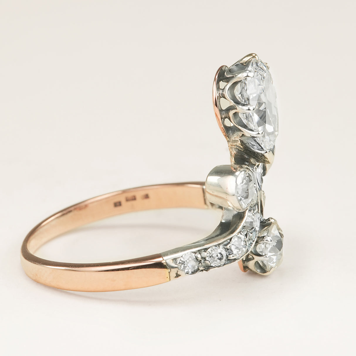 Antique, Edwardian pear cut diamond motif engagement ring