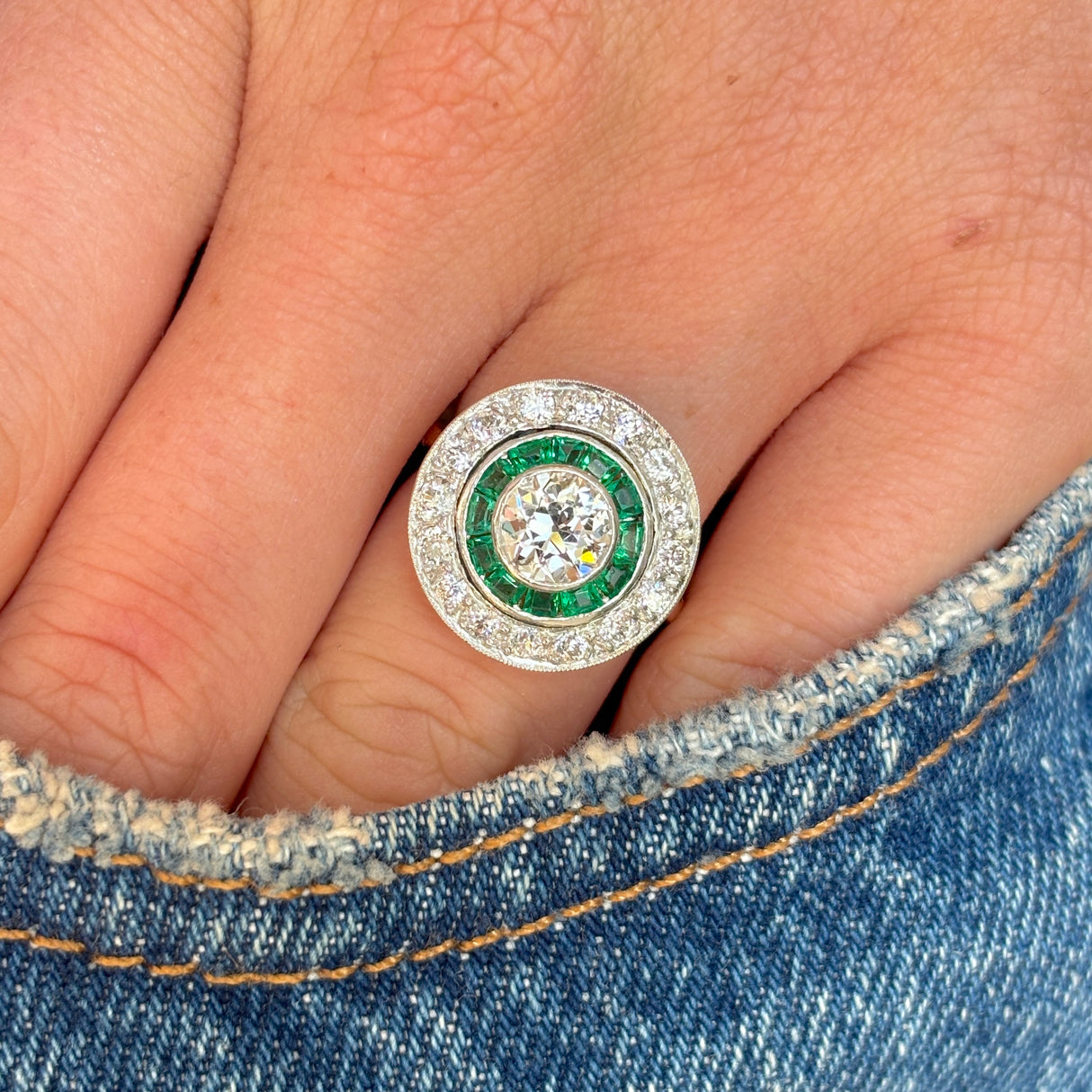Art Deco emerald & diamond target cluster ring, circa 1920s