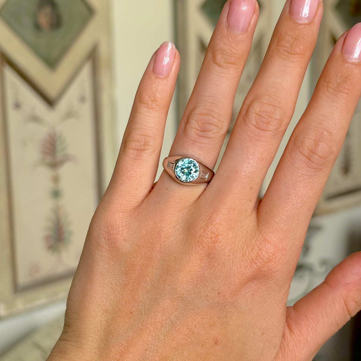 Vintage rub-over zircon & diamond ring front on hand