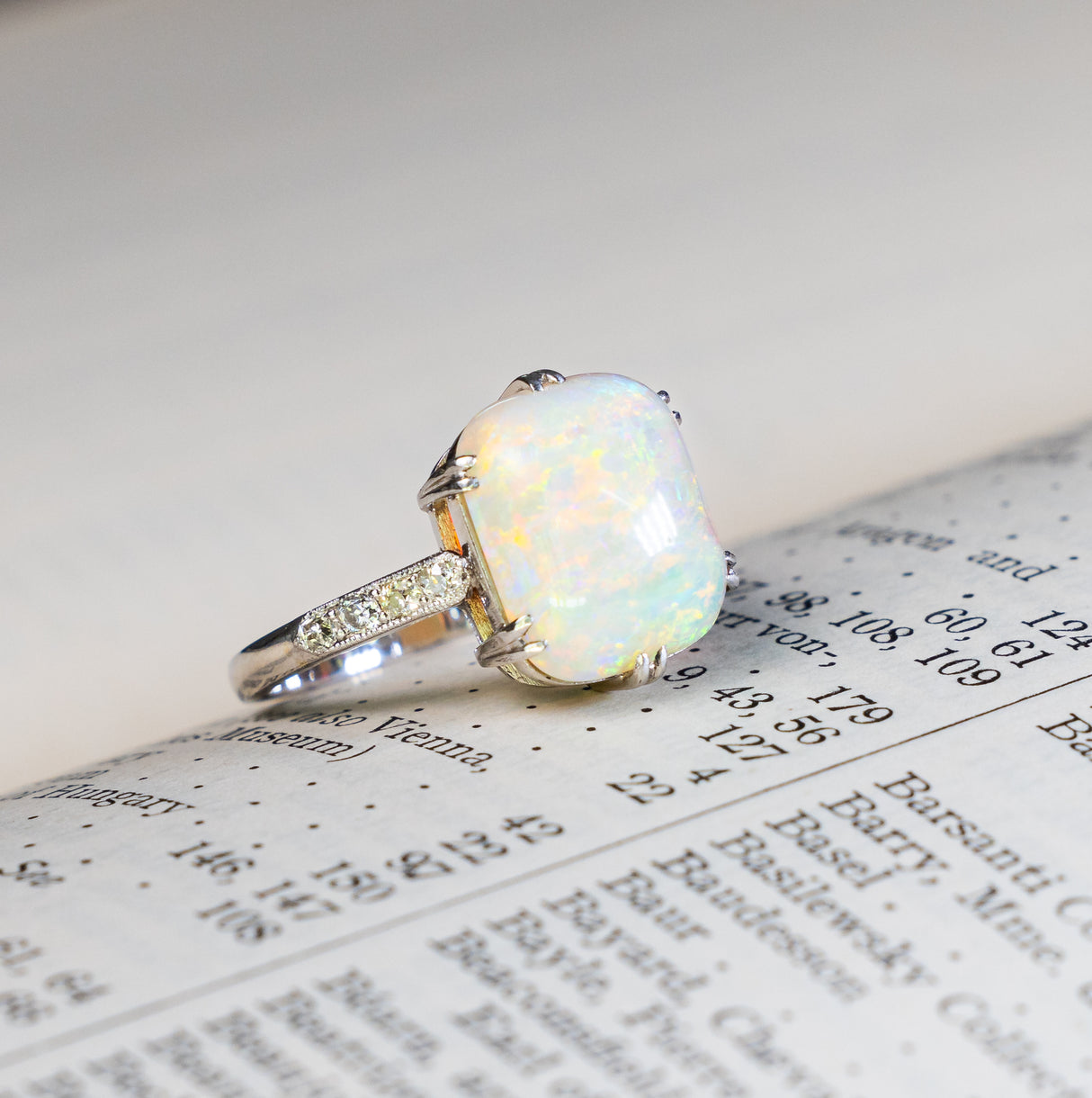 Vintage, Art Deco cabochon opal and diamond ring side