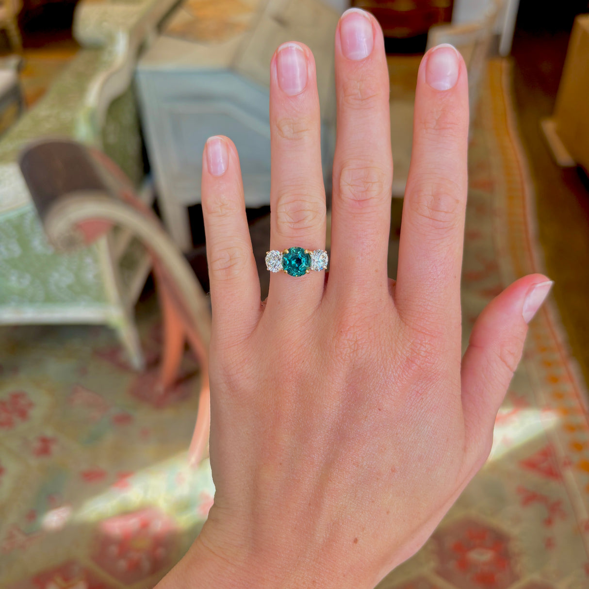 Vintage, teal sapphire and diamond three-stone engagement ring