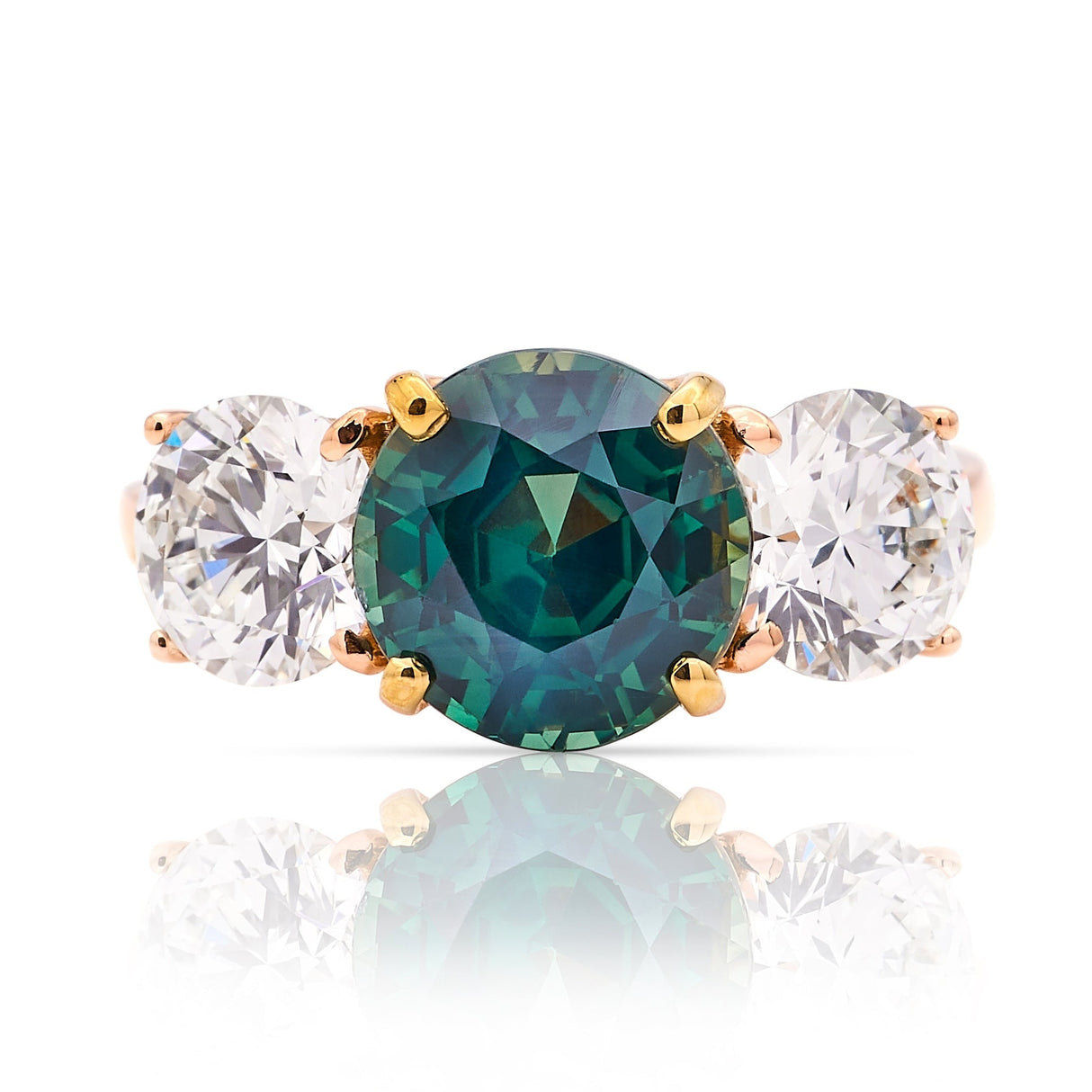 Vintage, teal sapphire and diamond three-stone engagement ring