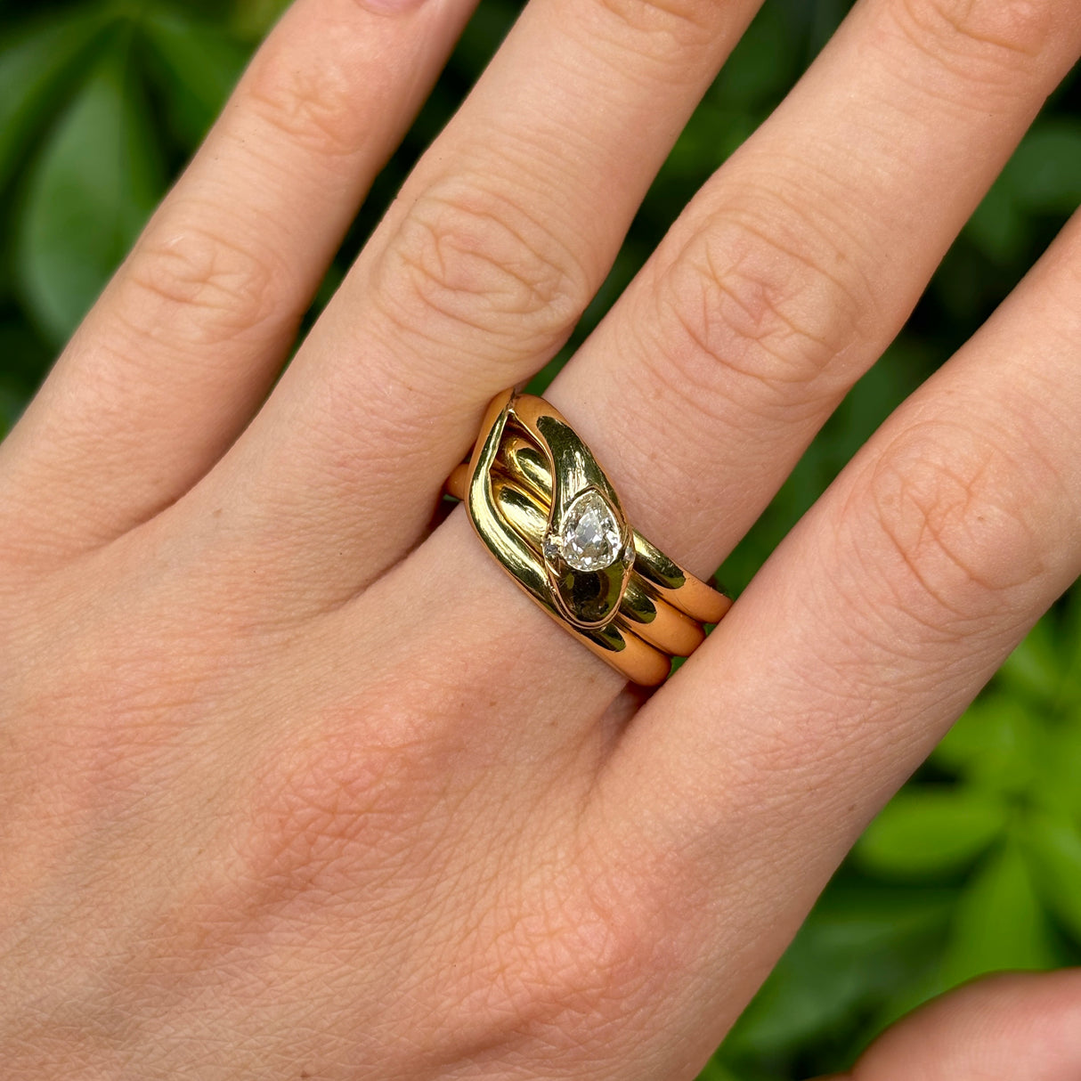 Antique, Victorian diamond set snake ring, 18ct yellow gold worn on hand.