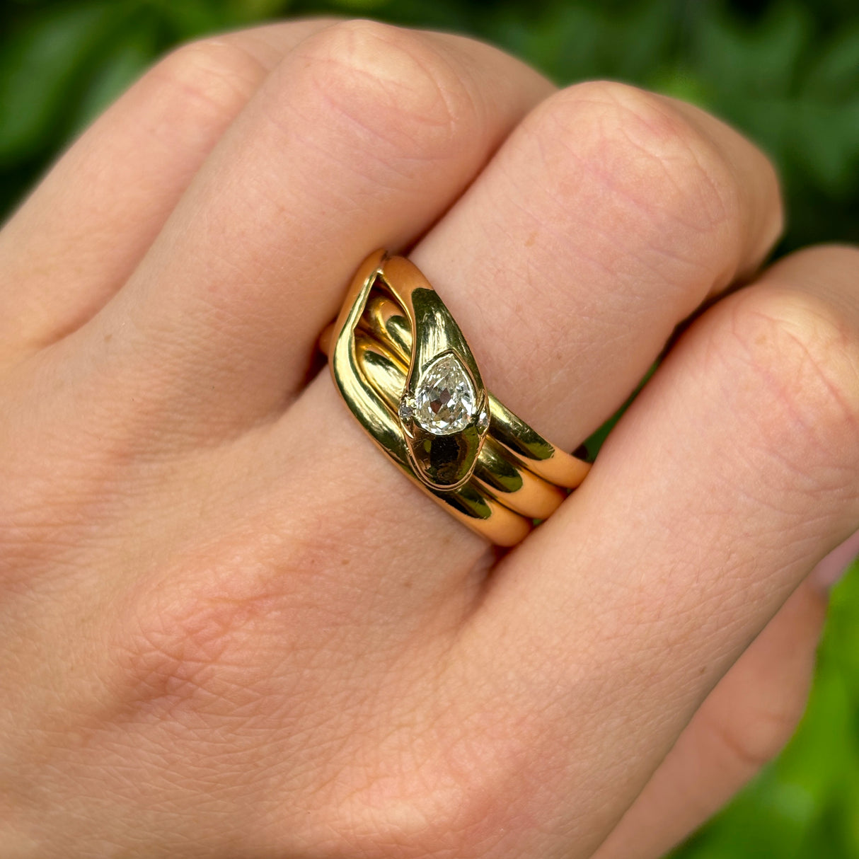 Antique, Victorian diamond set snake ring, 18ct yellow gold worn on hand.