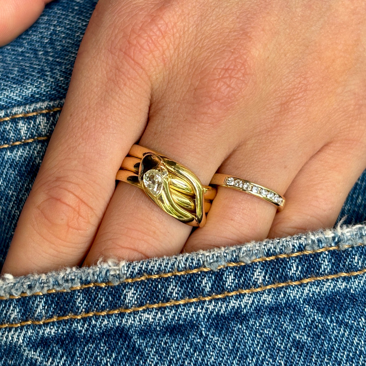 Antique, Victorian diamond set snake ring, 18ct yellow gold worn on hand.