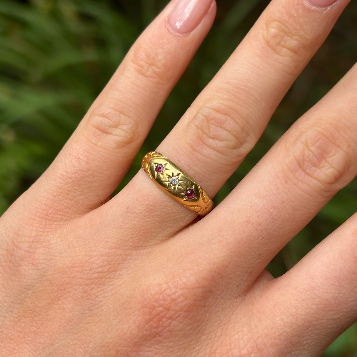 Antique, Edwardian ruby and diamond gypsy ring on hand