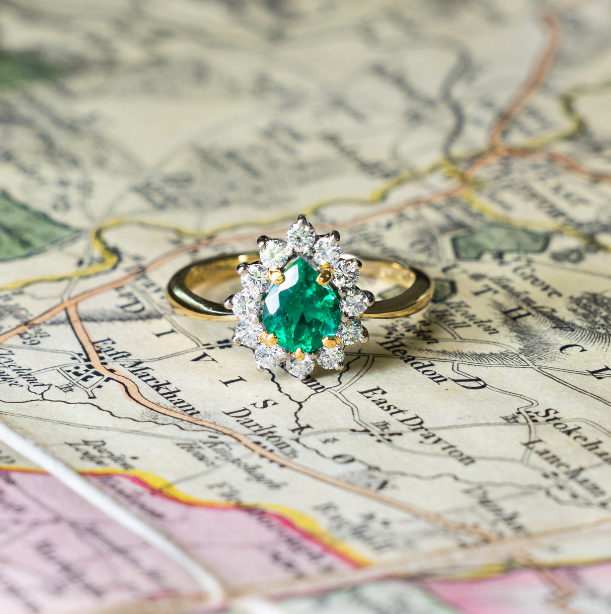 Vintage, 1980s pear-cut emerald & diamond cluster ring front