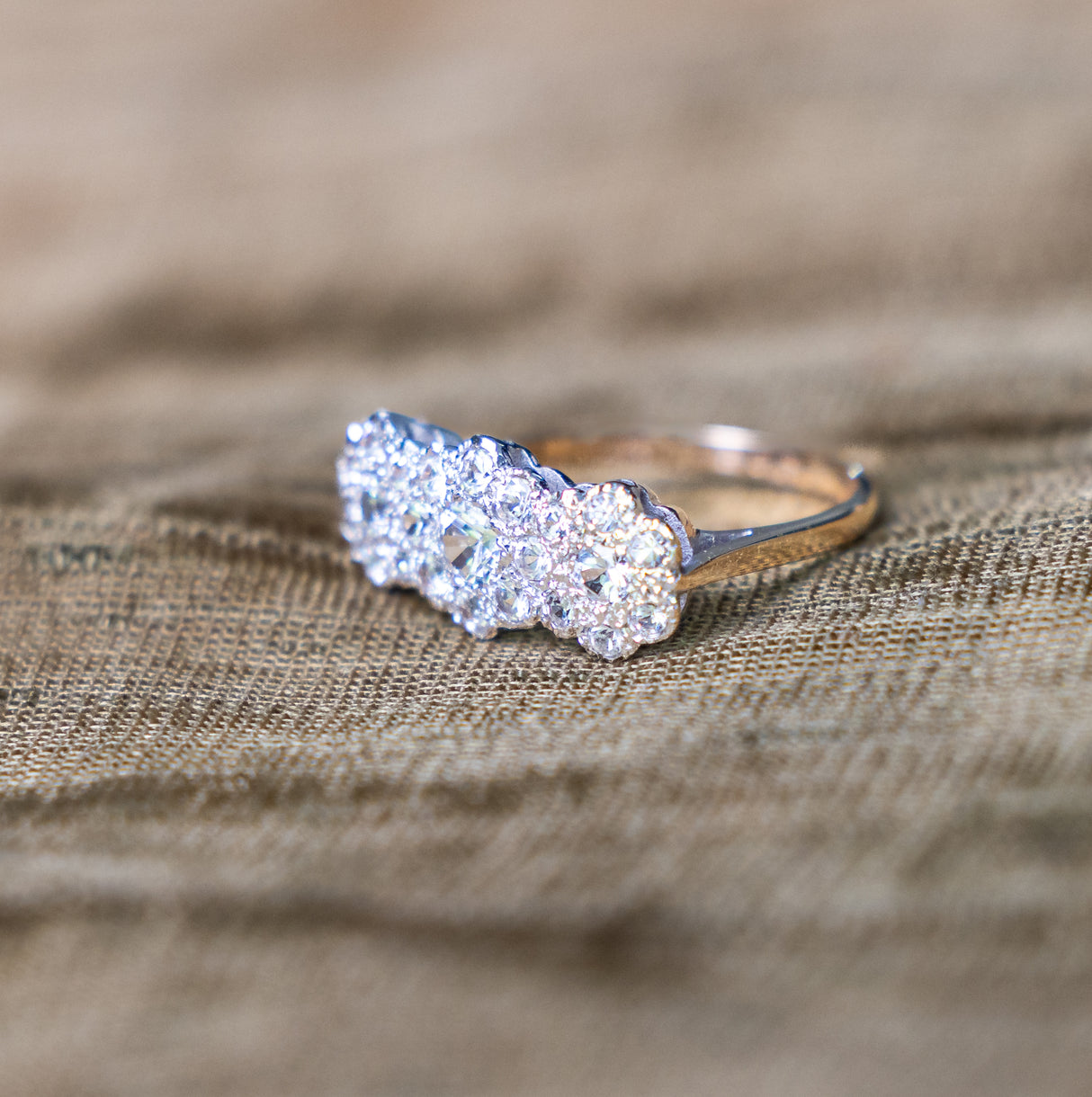 Vintage, 1970s cubic zirconia triple cluster ring side