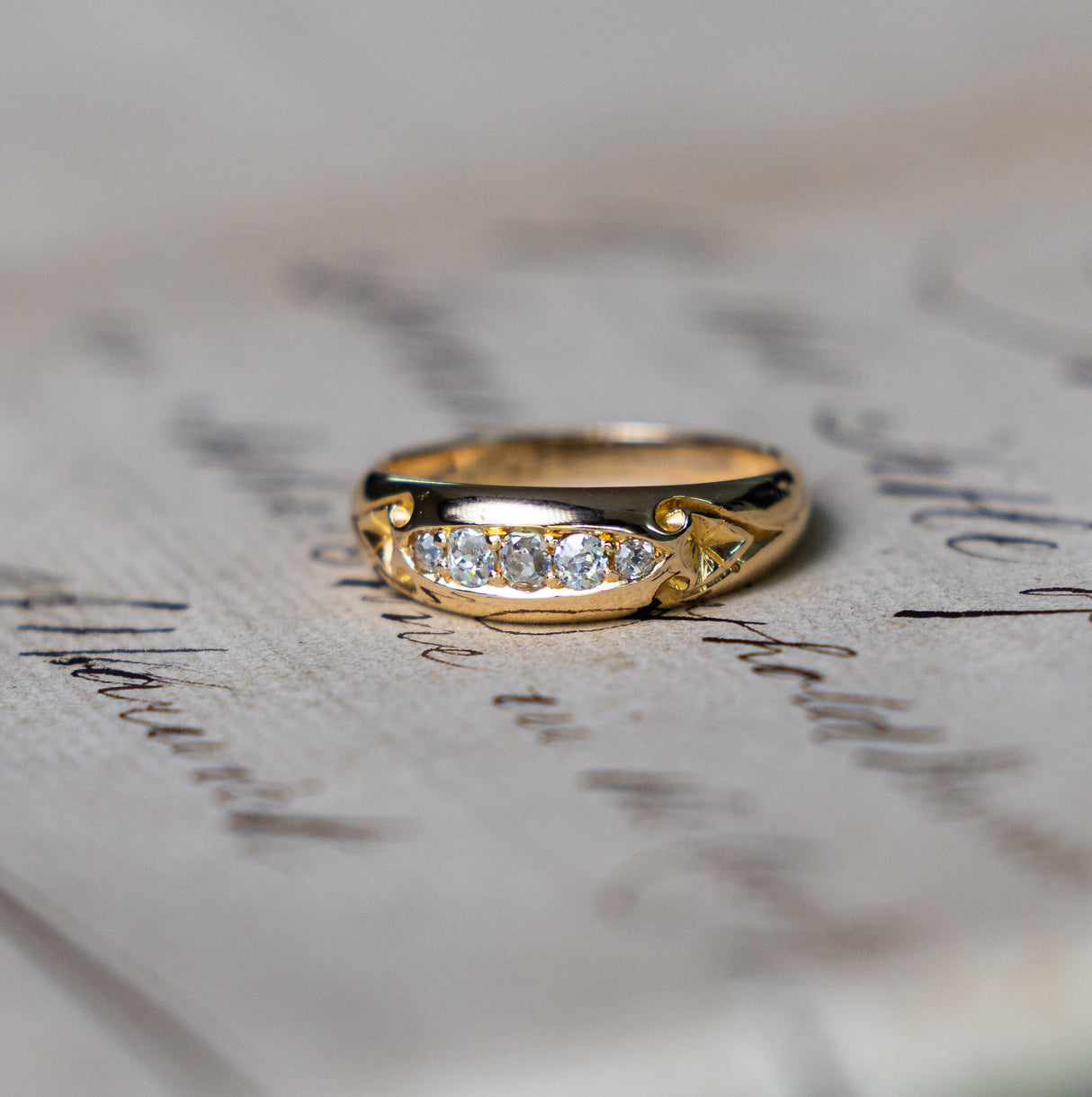 Antique, Edwardian five stone diamond engagement ring front