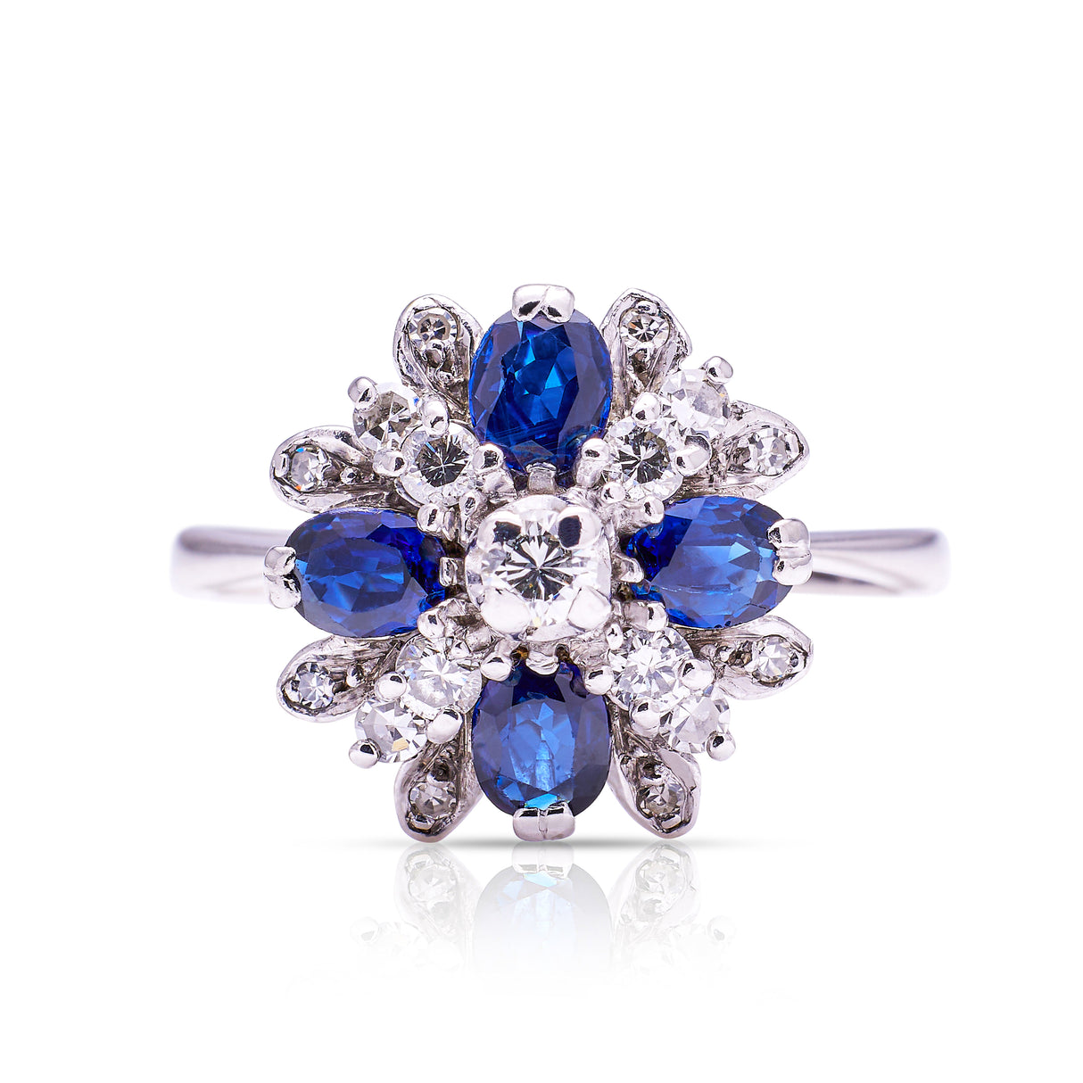 Sapphire and diamond cluster ring from 80s, front view.