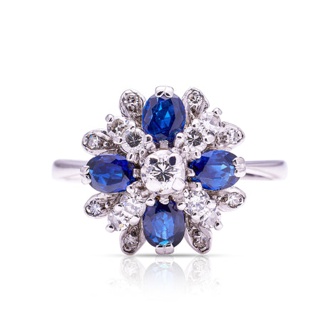 Sapphire and diamond cluster ring from 80s, front view. 