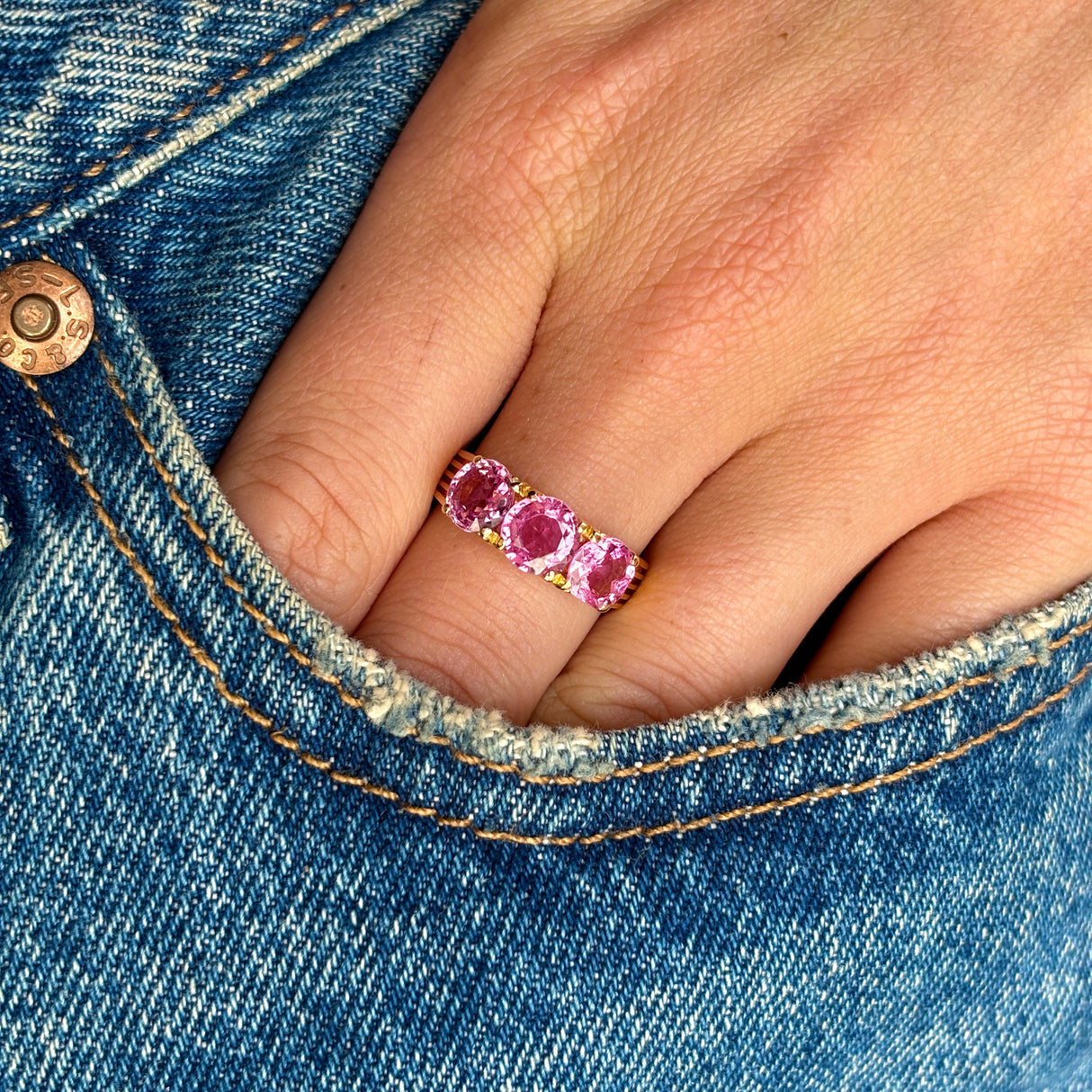 2077-Vintage, 1930s pink sapphire three-stone ring- on hand