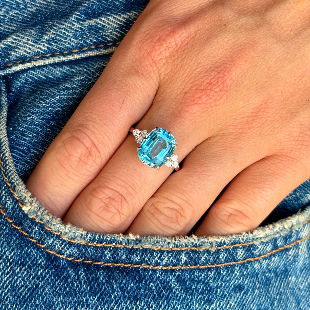 Vintage, 1970s blue topaz & diamond ring worn on hand.