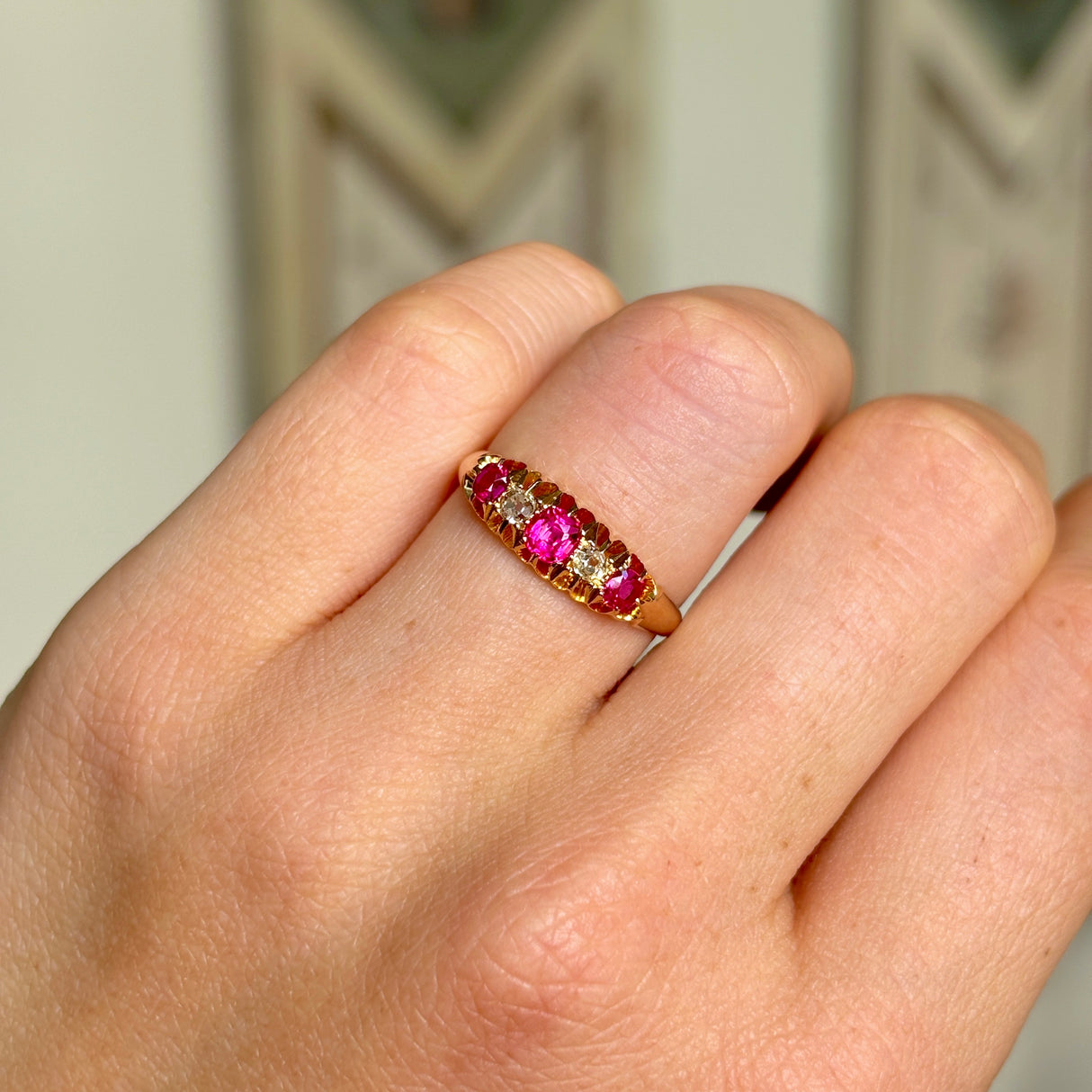Antique, Edwardian pink sapphire & diamond five-stone ring, 18ct yellow gold worn on hand