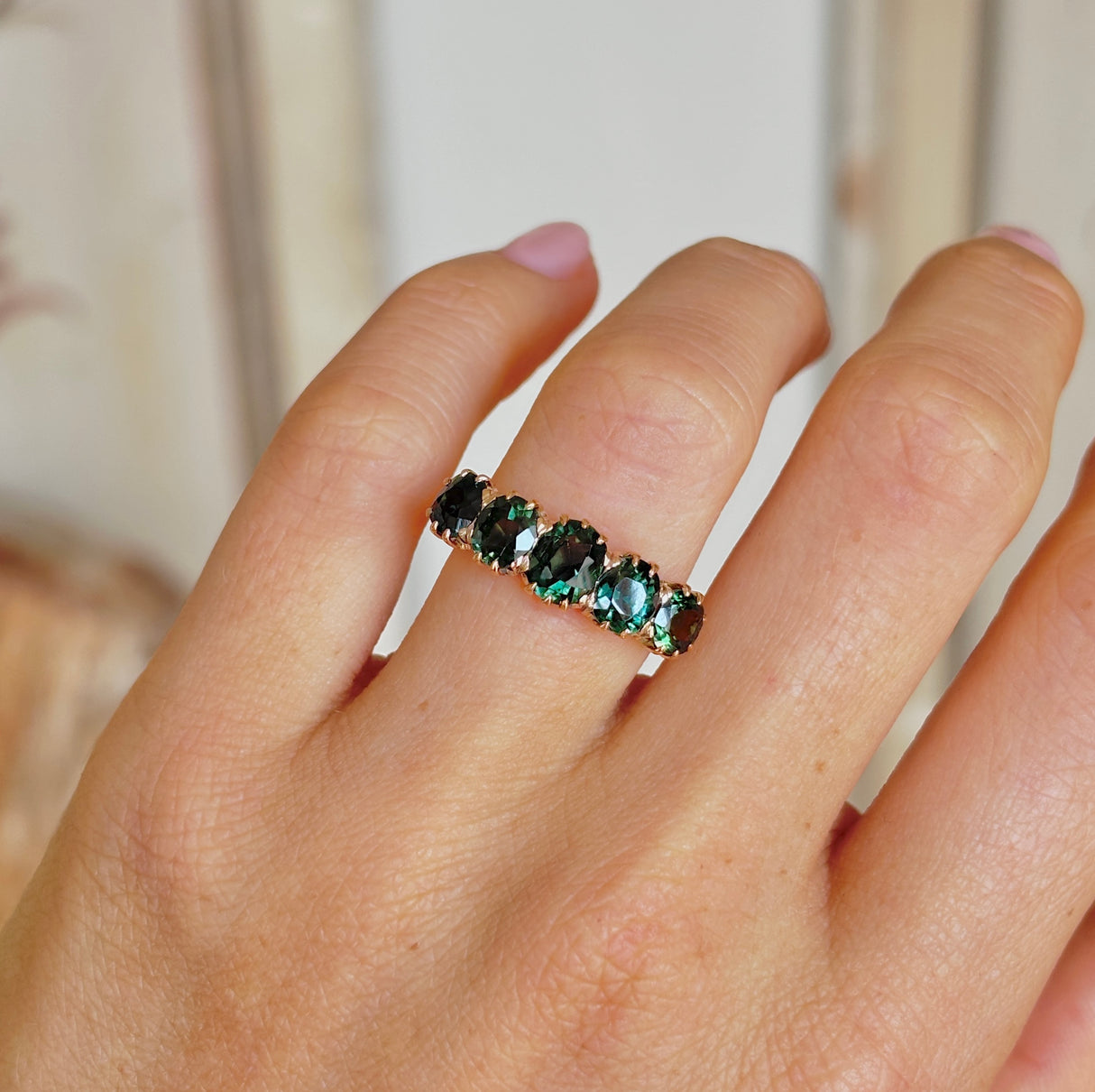 Antique, Victorian green sapphire five-stone ring