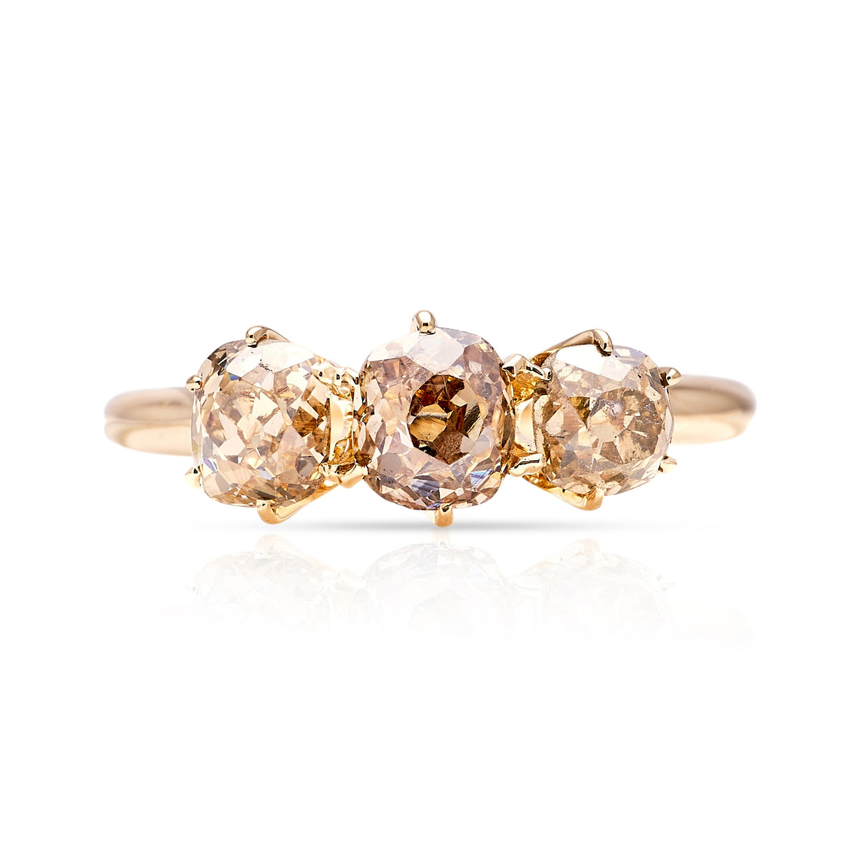 Antique, yellow-brown diamond three-stone ring