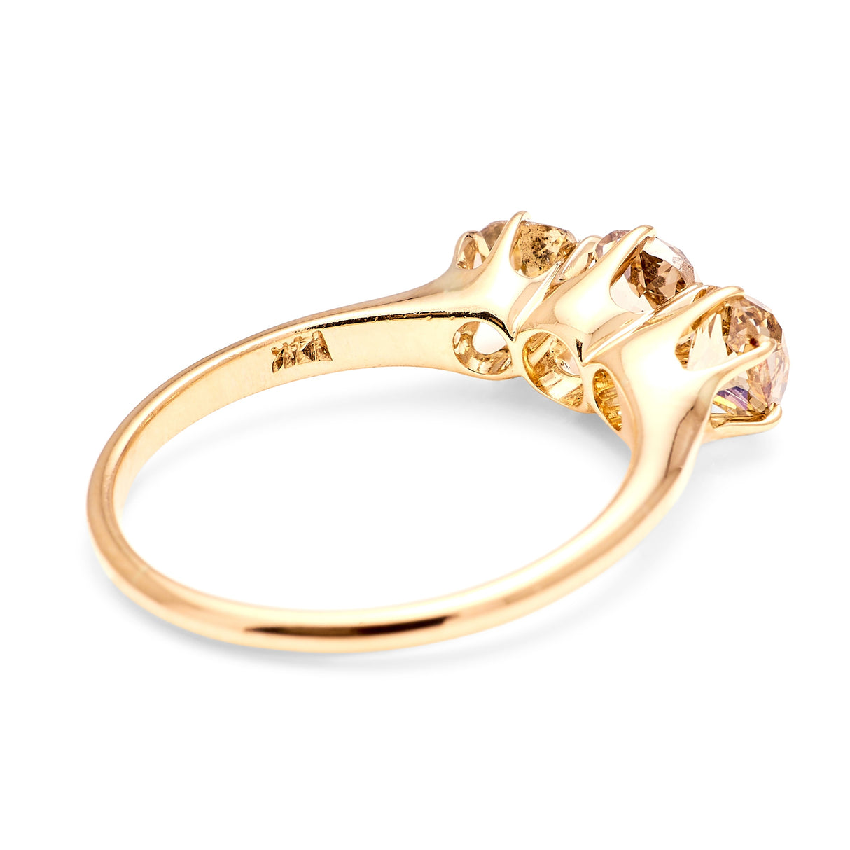 Antique, yellow-brown diamond three-stone ring