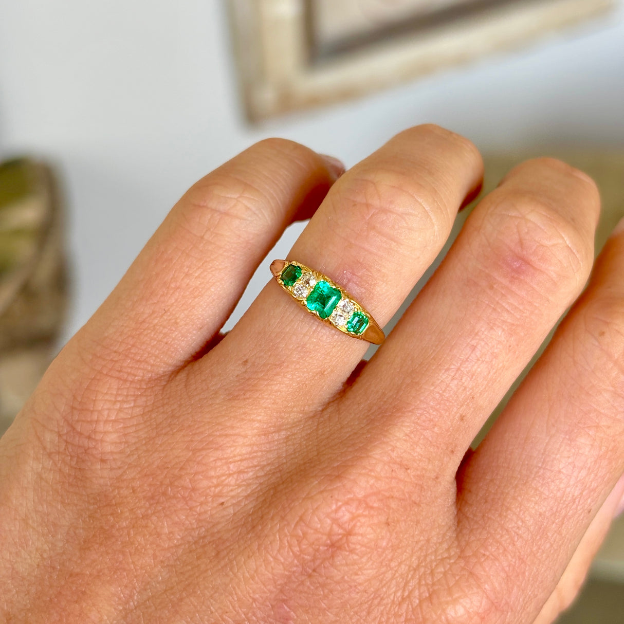 Antique, Edwardian emerald & diamond three-stone ring