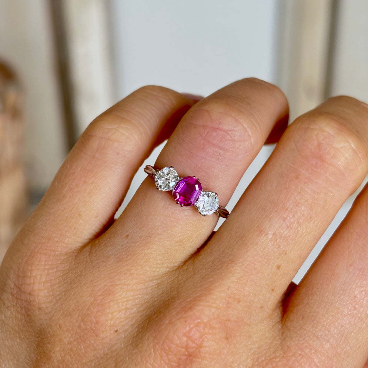 Antique, Edwardian pink sapphire & diamond three-stone ring
