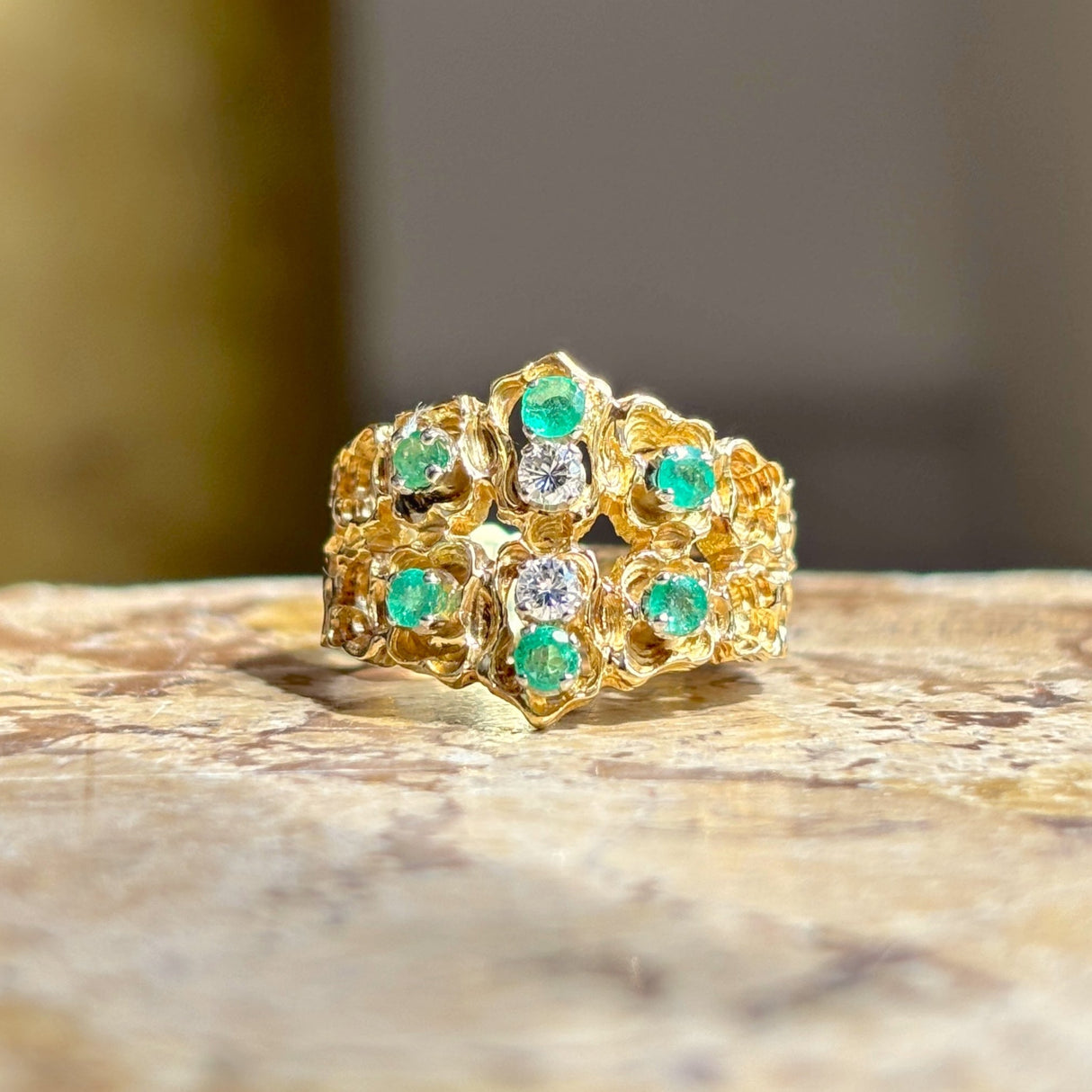 Vintage, textured diamond & emerald ring