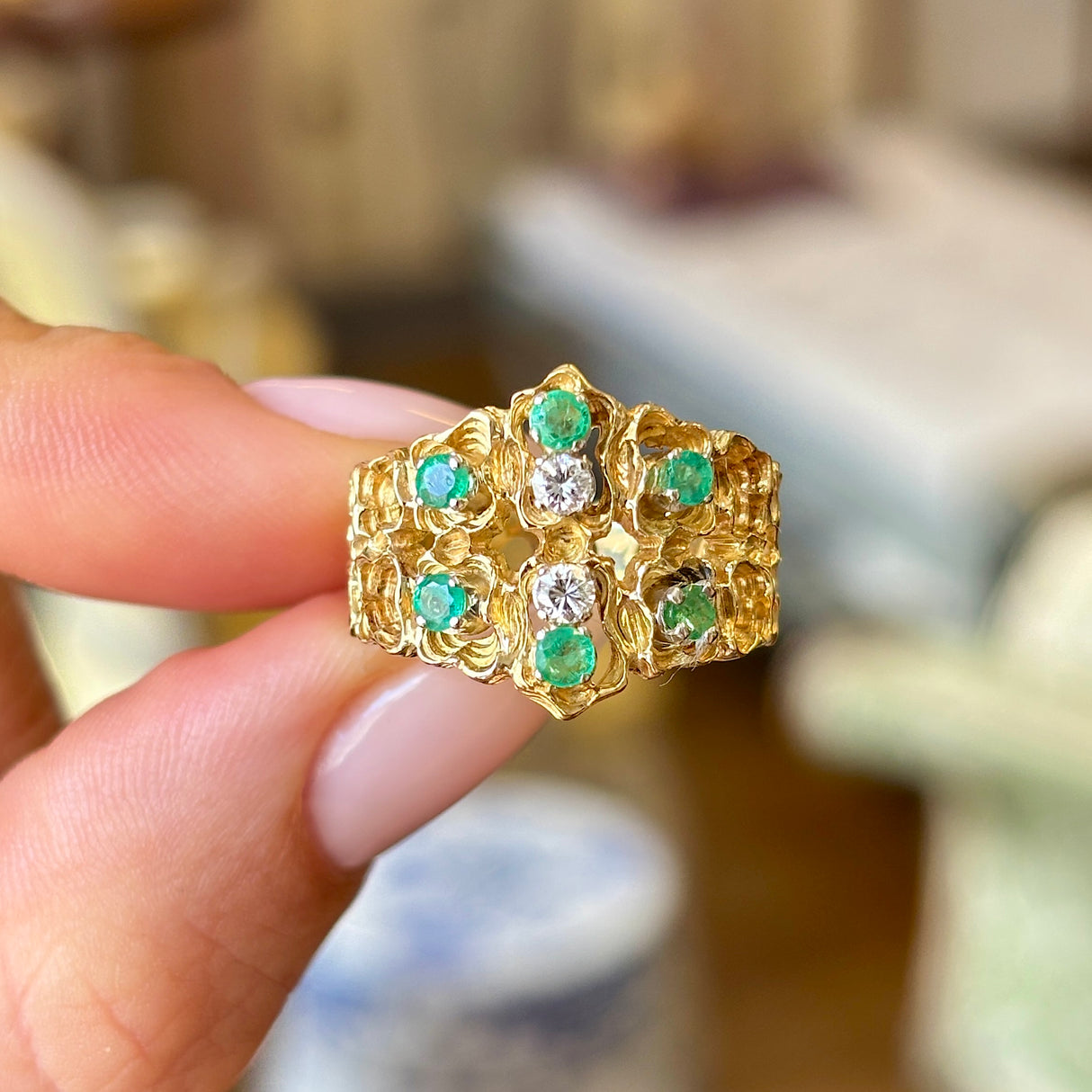 Vintage, textured diamond & emerald ring