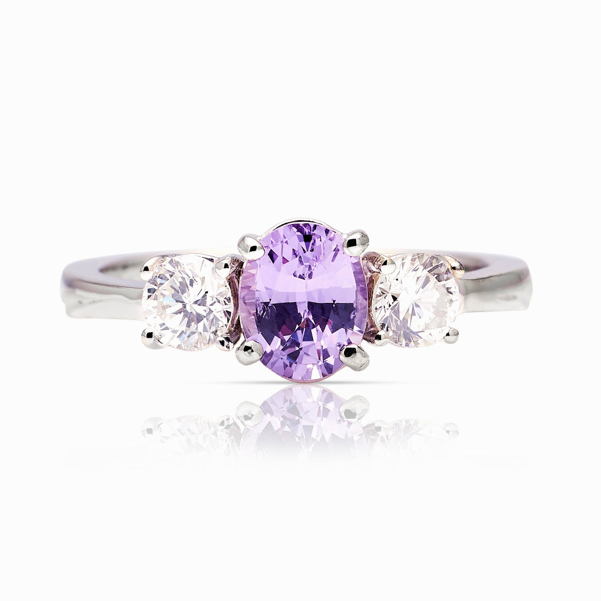 Vintage, 1980s pink sapphire & diamond three-stone ring