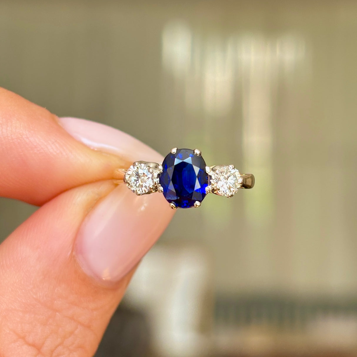 Antique, Edwardian three-stone sapphire & diamond ring