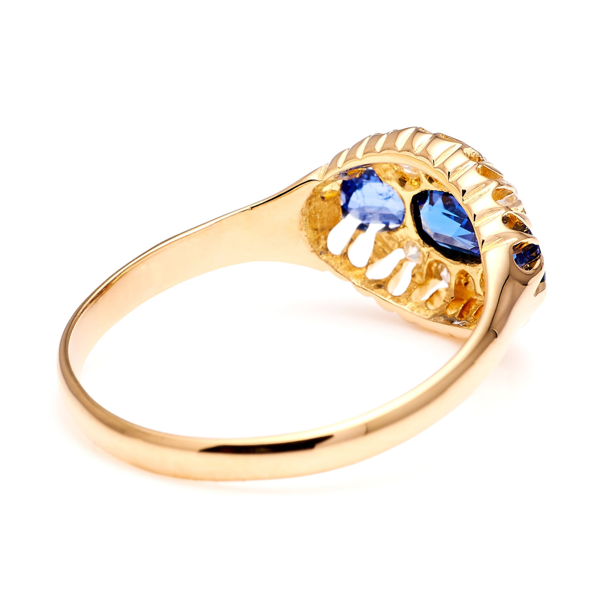 Antique, Edwardian three-stone sapphire cluster ring
