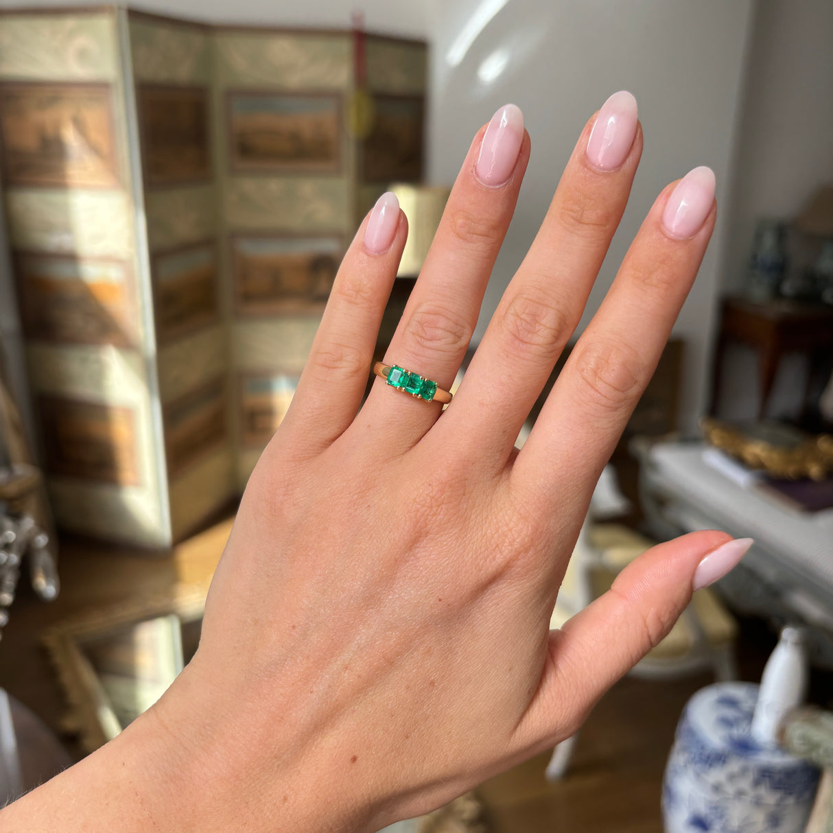 Vintage, 1990s three-stone emerald ring