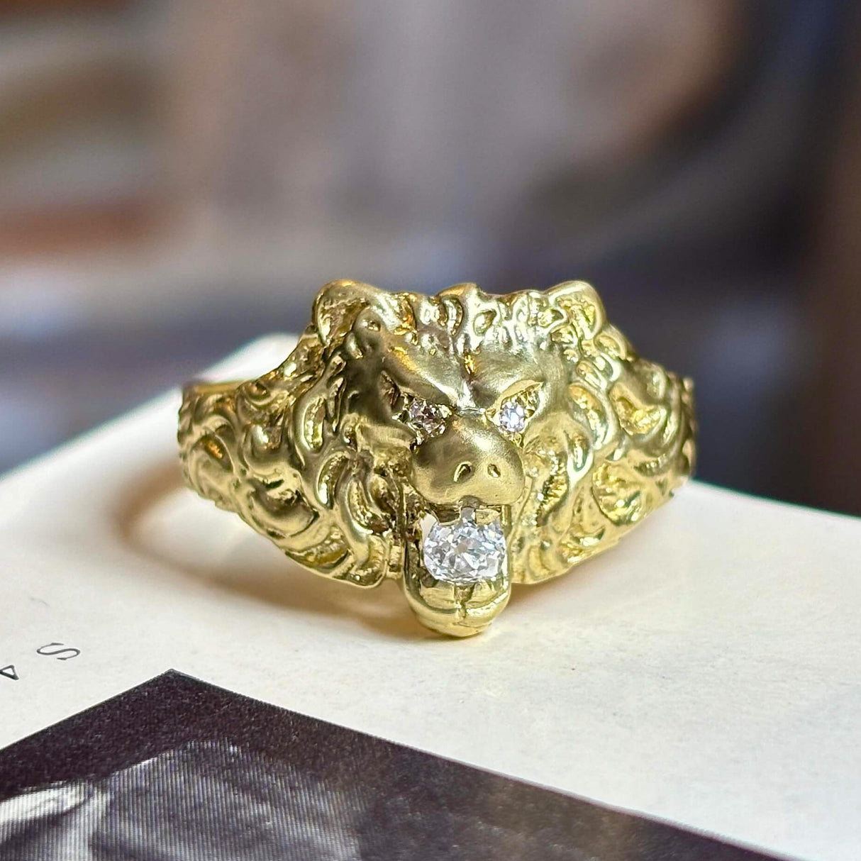 Vintage 1950s old-cut diamond lion’s head ring with diamond-set eyes