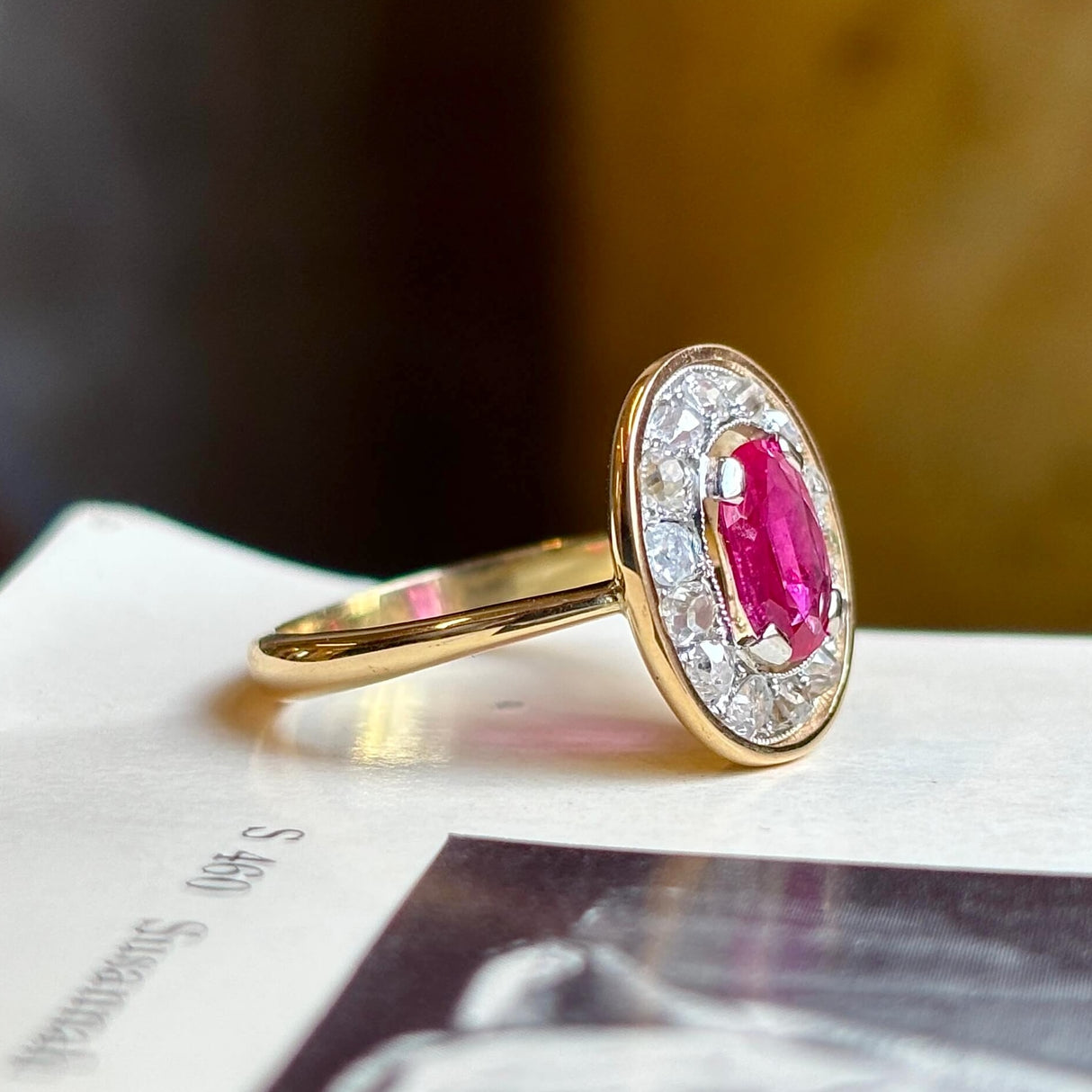 Antique, French, oval-cut ruby & diamond cluster ring