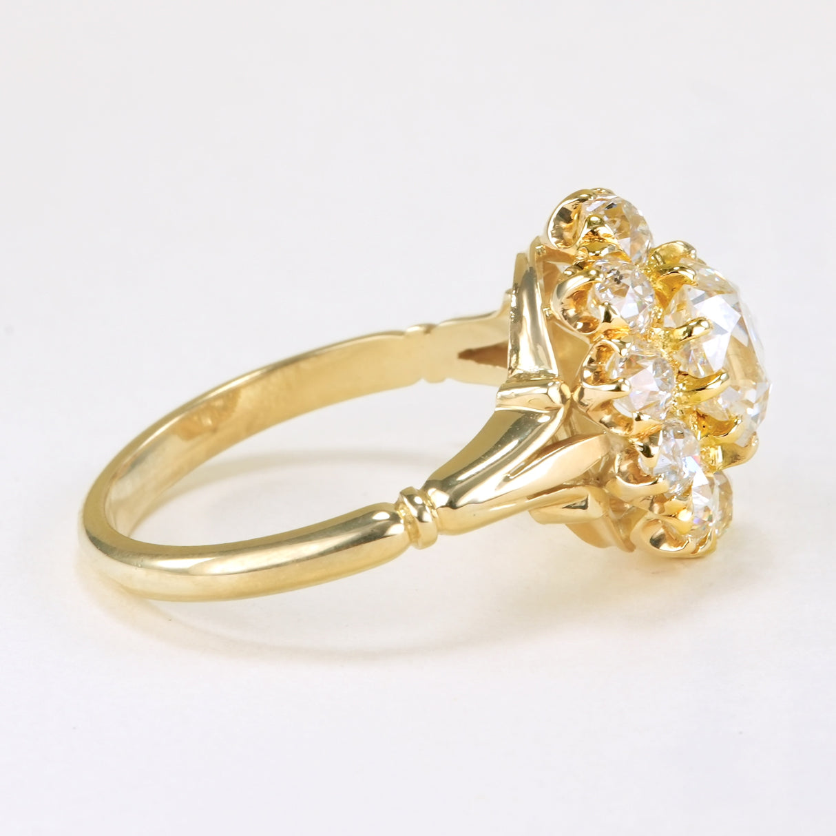 Antique, Edwardian old-cut diamond cluster engagement ring