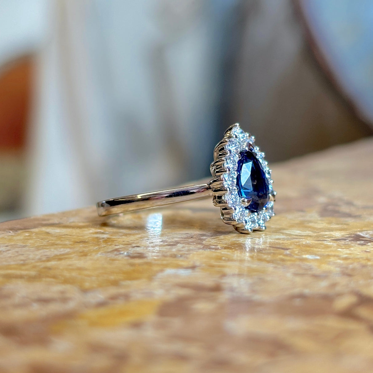 Pear-cut sapphire & diamond cluster ring