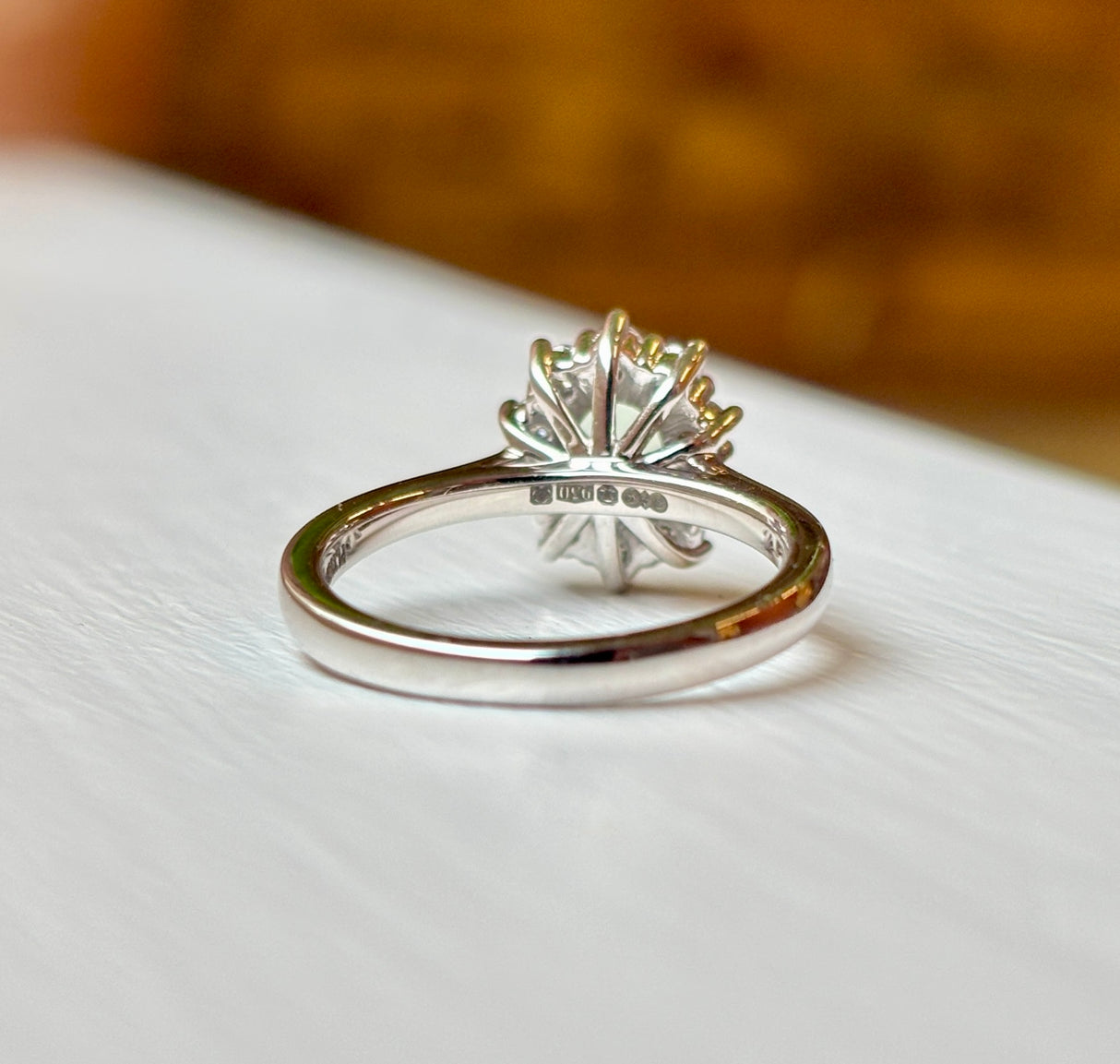 Oval-cut green sapphire & diamond cluster ring