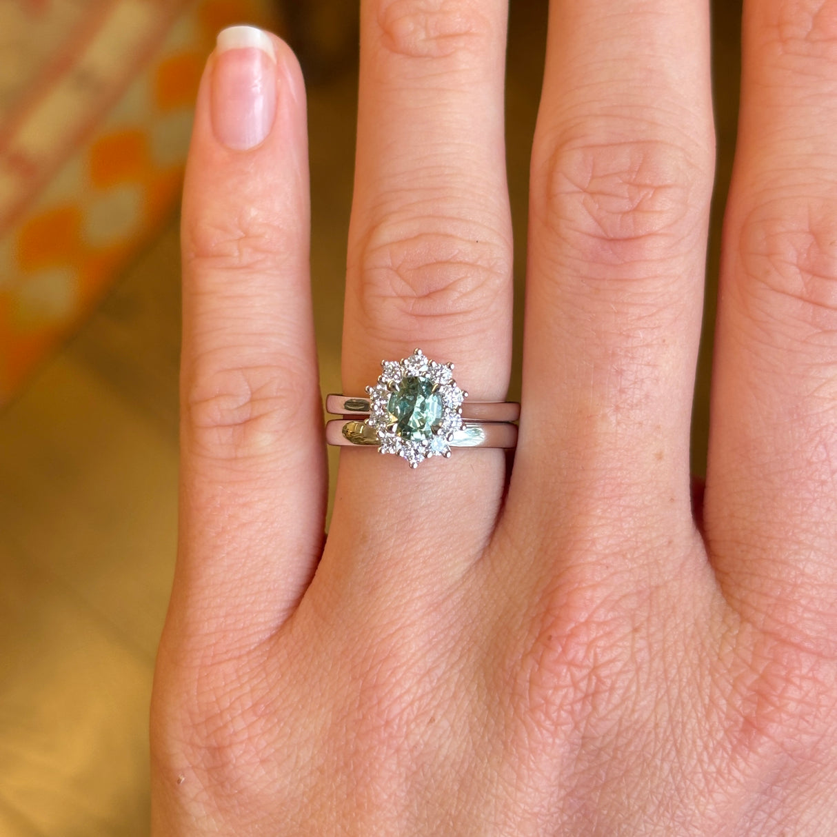 Oval-cut green sapphire & diamond cluster ring