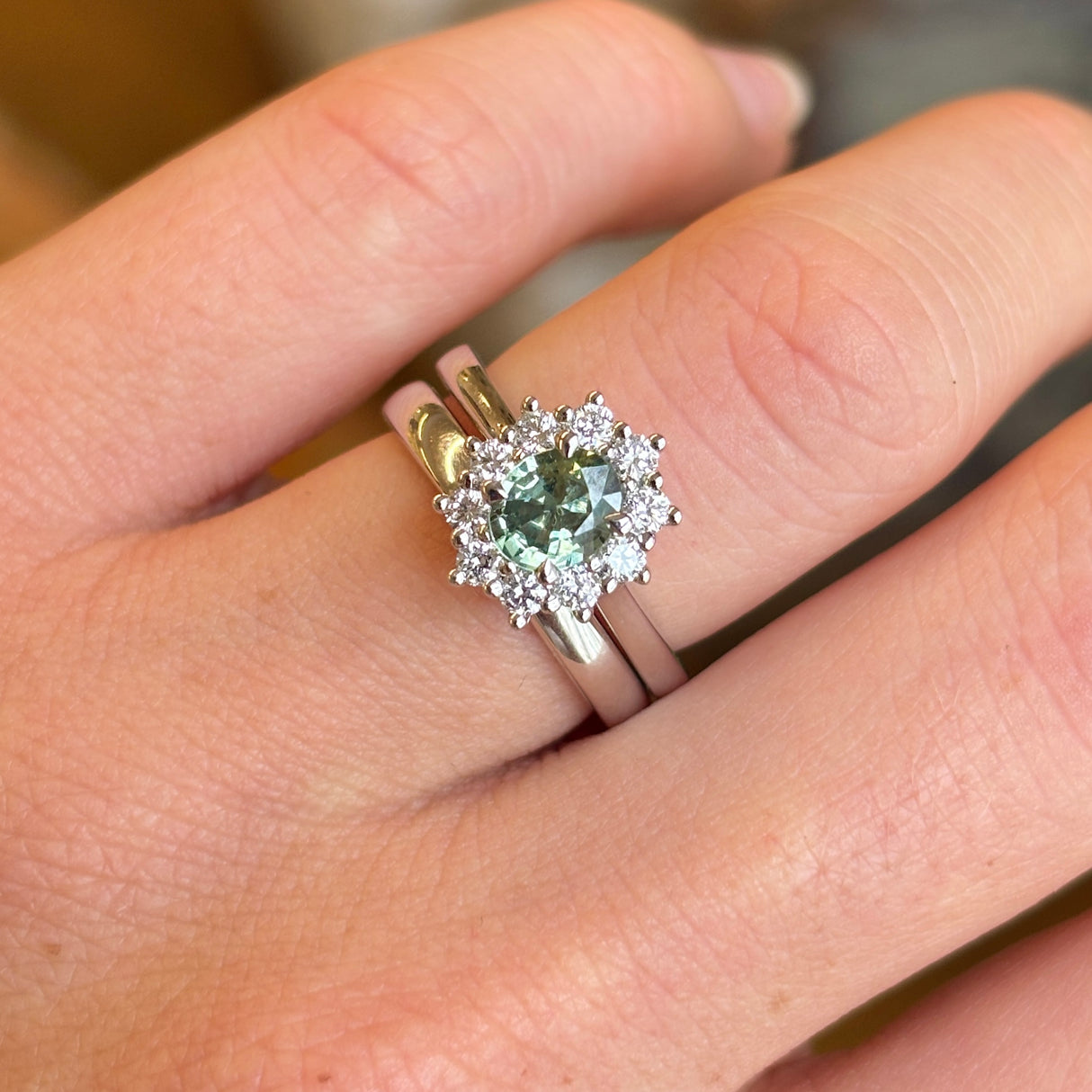 Oval-cut green sapphire & diamond cluster ring