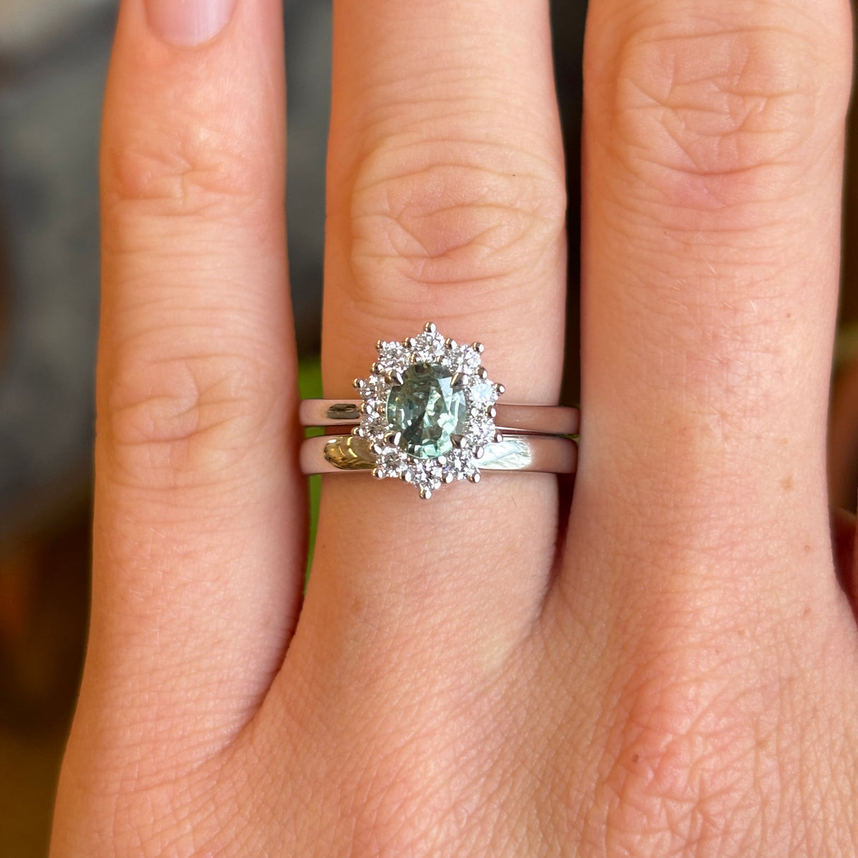 Oval-cut green sapphire & diamond cluster ring