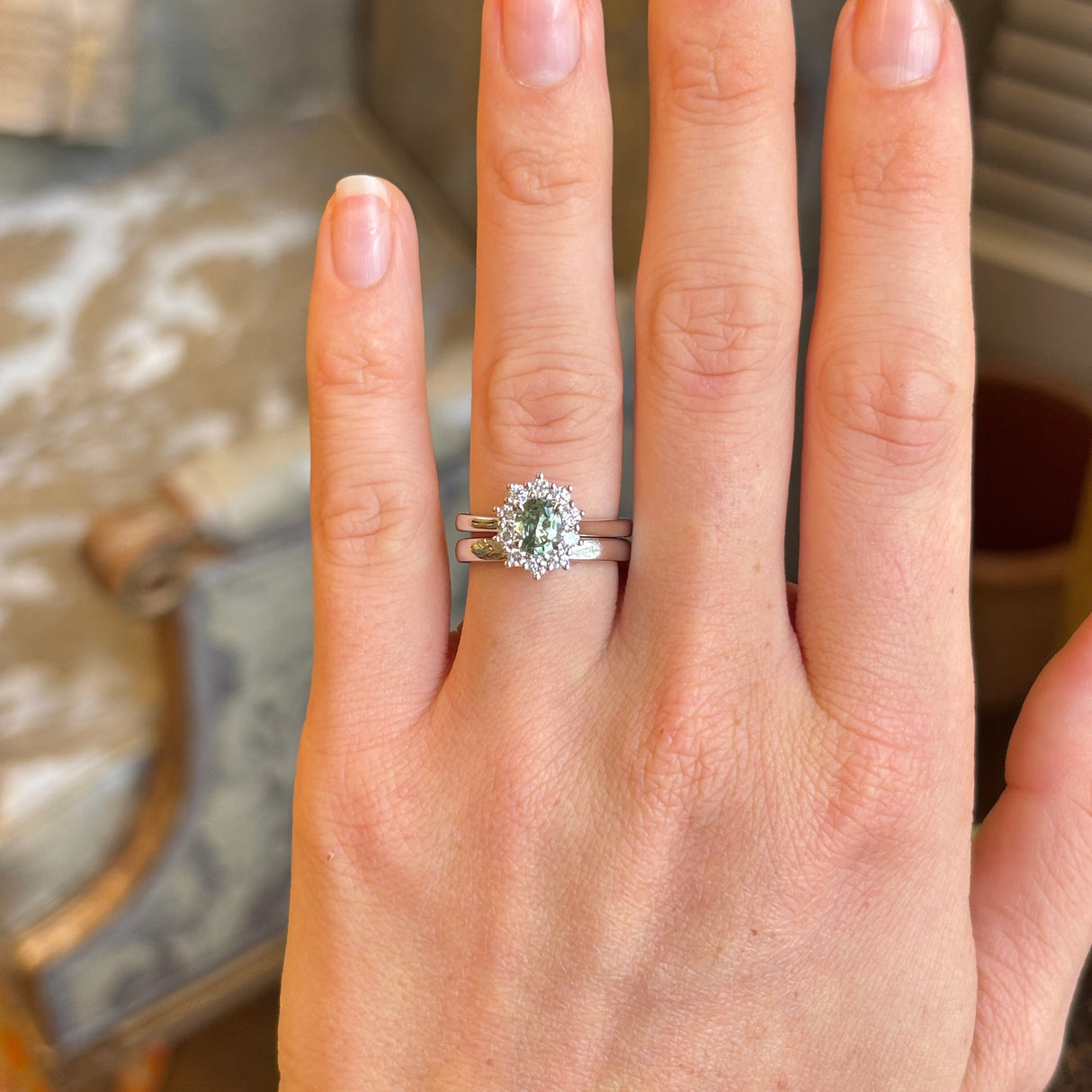 Oval-cut green sapphire & diamond cluster ring