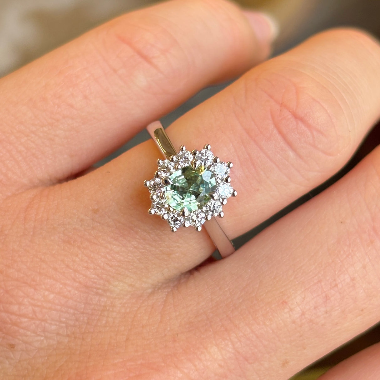 Oval-cut green sapphire & diamond cluster ring