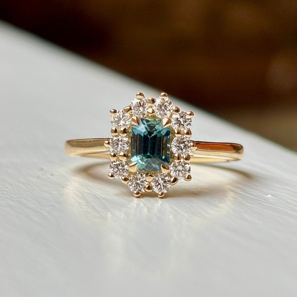 teal sapphire & diamond cluster ring