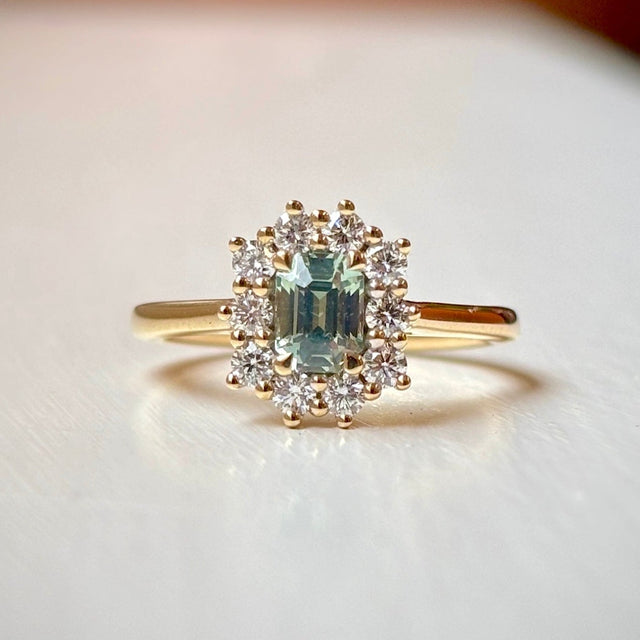 Octagon-cut green sapphire & diamond cluster engagement ring