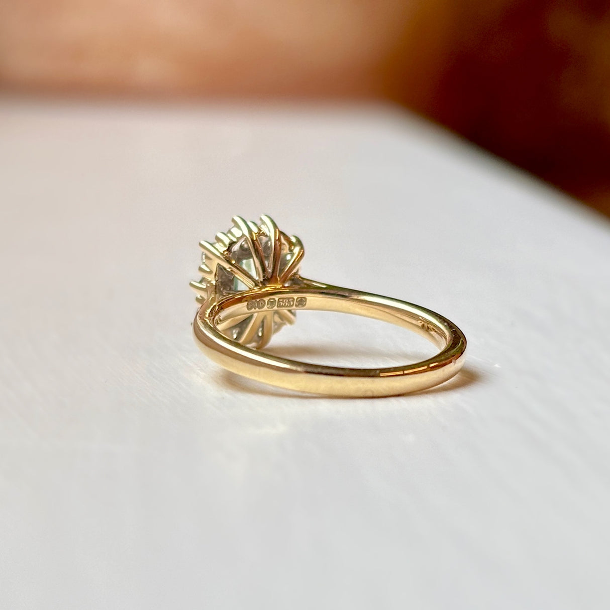 Octagon-cut green sapphire & diamond cluster engagement ring