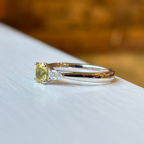 Oval-cut yellow sapphire & diamond three-stone ring