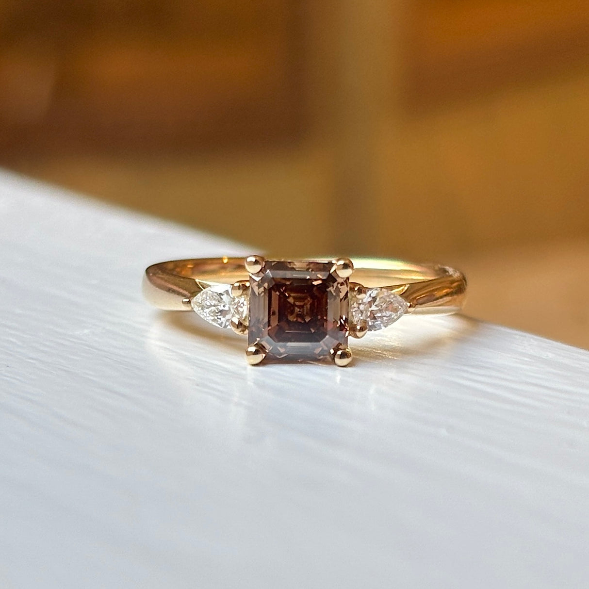 Asscher-cut brown sapphire & diamond three-stone ring