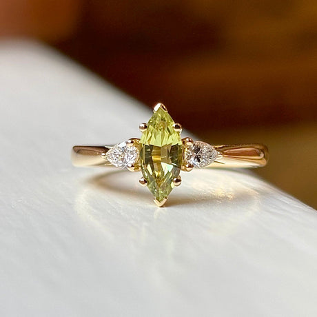 Marquise-cut yellow sapphire & diamond three-stone ring