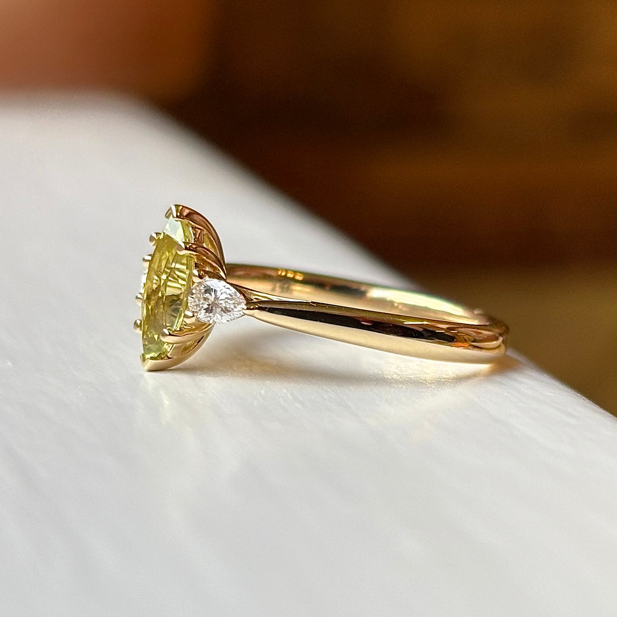 Marquise-cut yellow sapphire & diamond three-stone ring