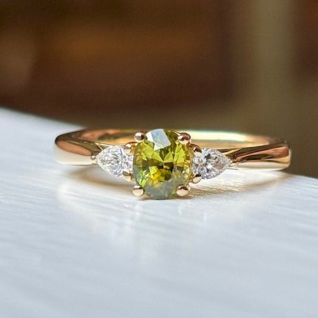 Oval-cut yellow sapphire & diamond three-stone ring