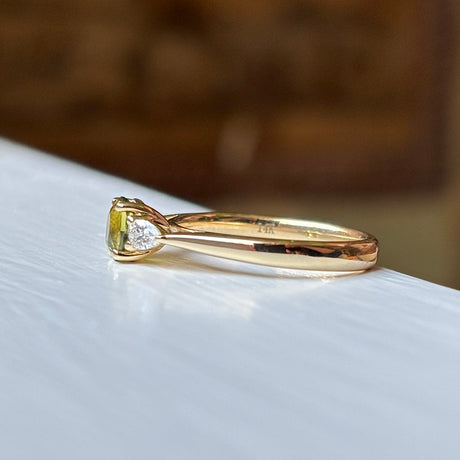 Oval-cut yellow sapphire & diamond three-stone ring