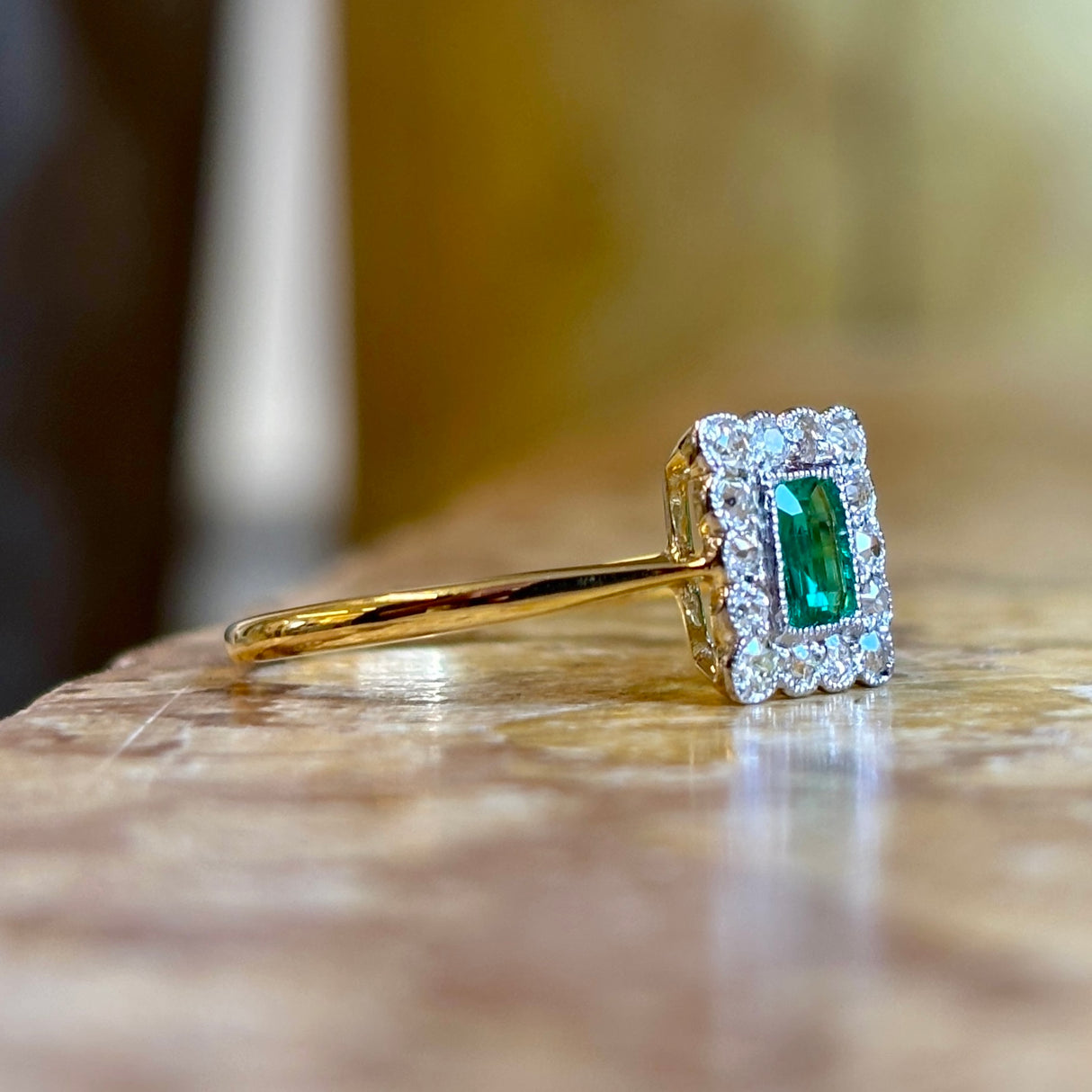 Antique, Edwardian emerald & diamond cluster engagement ring